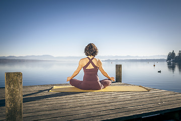 Image showing yoga woman sitting lake