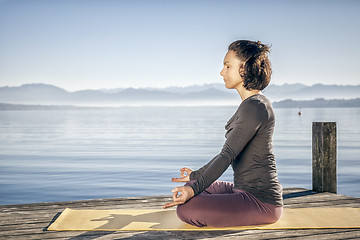 Image showing yoga woman sitting lake