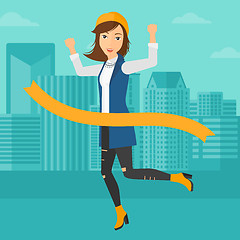 Image showing Business woman crossing finish line.