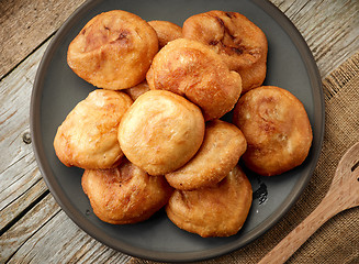 Image showing fried meat pies on dark plate