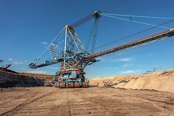 Image showing Large excavator machine in the mine