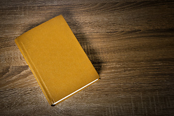 Image showing Yellow book on the table