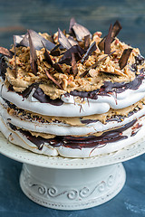 Image showing Coffee cake with nuts and chocolate. View from above.