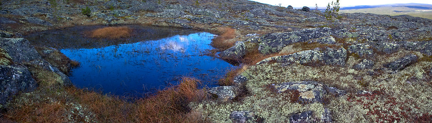 Image showing Eye of the North. Blue small lake among mountain tundra.