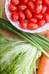 Image showing vegetables on a wooden background