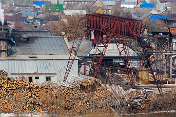 Image showing pile of wood logs on plywood combine. Tyumen