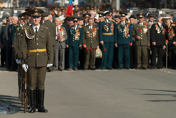 Image showing Soldiers of guard of honor at veterans background