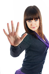 Image showing Pretty girl shows stop gesture