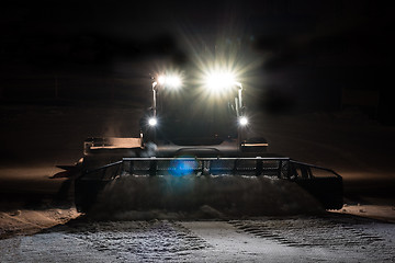 Image showing Snowcat preparing a slope at night 