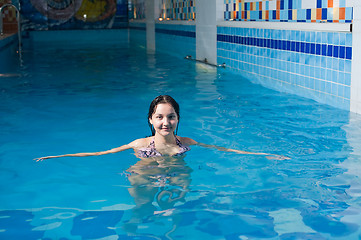 Image showing Attractive girl in swimming pool