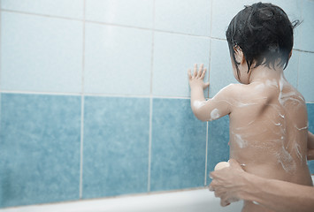 Image showing Baby taking a bath