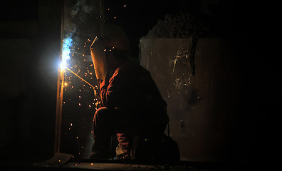 Image showing worker welding steel 