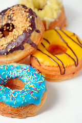 Image showing Colorful and tasty donuts