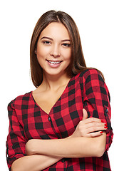 Image showing Teen female smiling with braces on her teeth