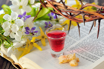 Image showing Communion cup with wine and bread