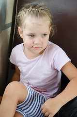 Image showing Sad girl sitting on a chair in an electric train