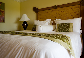 Image showing King sized bed in a hotel suite room

