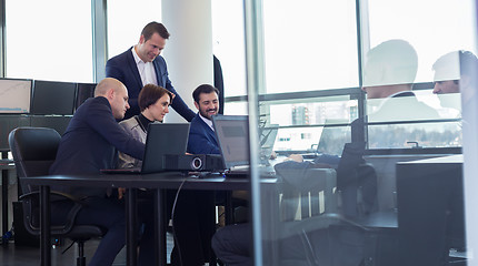 Image showing Business team working in corporate office.