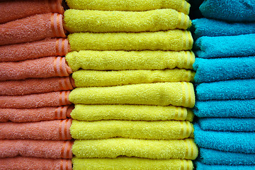 Image showing Stacks of multicolored towels