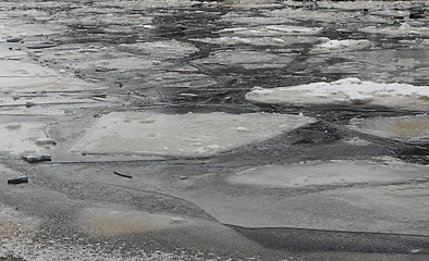 Image showing  blocks of ice on frozen river