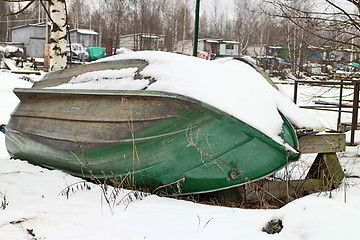 Image showing  old rowing boat under the snow