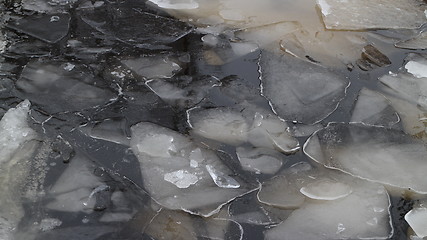 Image showing  blocks of ice on frozen river