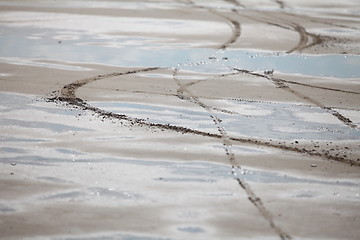 Image showing traces of the car on the sand