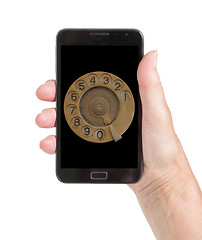 Image showing Senior woman hand with smart phone isolated, old fashion dial