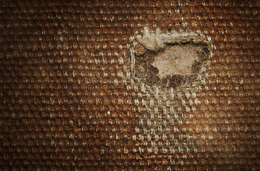 Image showing Detail (damage) of an old canvas suitcase, close-up