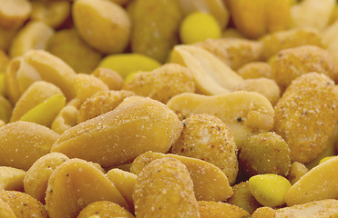 Image showing Fresh mixed salted nuts for backgrounds