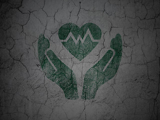 Image showing Insurance concept: Heart And Palm on grunge wall background