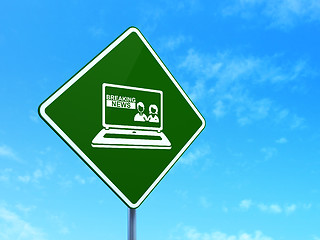 Image showing News concept: Breaking News On Laptop on road sign background