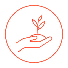 Image showing Hands holding seedling in soil line icon.