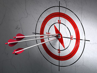 Image showing Tourism concept: arrows in Compass target on wall background