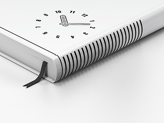 Image showing Time concept: closed book, Clock on white background