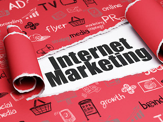 Image showing Marketing concept: black text Internet Marketing under the piece of  torn paper