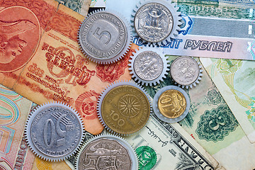 Image showing Coins gearweels on the money background