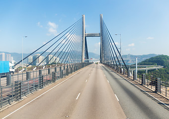 Image showing Suspension bridge in Hong Kong with clear blue sky