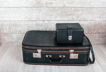 Image showing Two vintage black suitcase