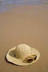 Image showing sunglass and a summer hat