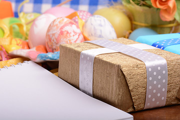 Image showing Easter background with eggs, ribbons and spring decoration