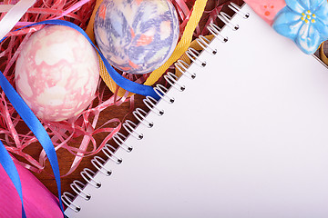 Image showing Easter background with eggs, ribbons and spring decoration