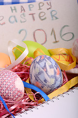 Image showing Easter background with eggs, ribbons and spring decoration