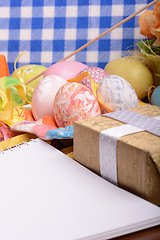 Image showing Easter background with eggs, ribbons and spring decoration