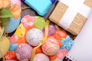 Image showing Easter background with eggs, ribbons and spring decoration