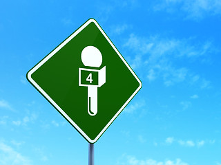 Image showing News concept: Microphone on road sign background