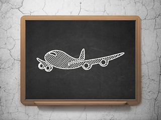 Image showing Tourism concept: Airplane on chalkboard background