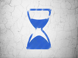 Image showing Timeline concept: Hourglass on wall background