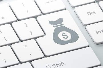 Image showing Finance concept: Money Bag on computer keyboard background