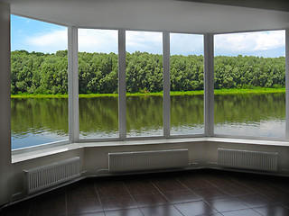 Image showing modern window of veranda overlooking the river 